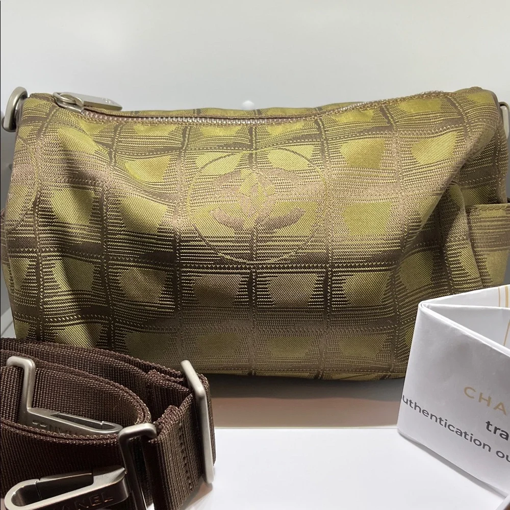 Chanel New Travel Line Mini Roll or Barrel Bag in a khaki or olive green color